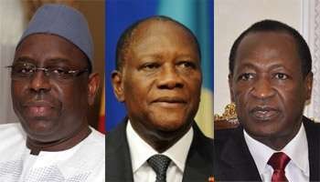 Macky Sall, Alassane Ouattara, Blaise Compaoré. © AFP 