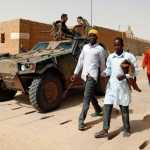 French soldiers patrol outside Djinguereber mosque after Friday prayers in the centre of Timbuktu