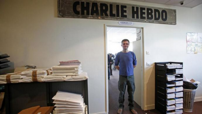 Charlie Hebdo: un an après l'attentat, Charlie Hebdo met un Dieu assassin à la Une