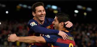 Lionel Messi fête un but avec Luis Suarez le 14 février 2016. - LLUIS GENE / AFP