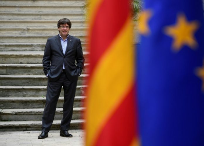 Le président catalan Carles Puigdemont, le 30 septembre 2017 à Gérone / © AFP/Archives / PIERRE-PHILIPPE MARCOU